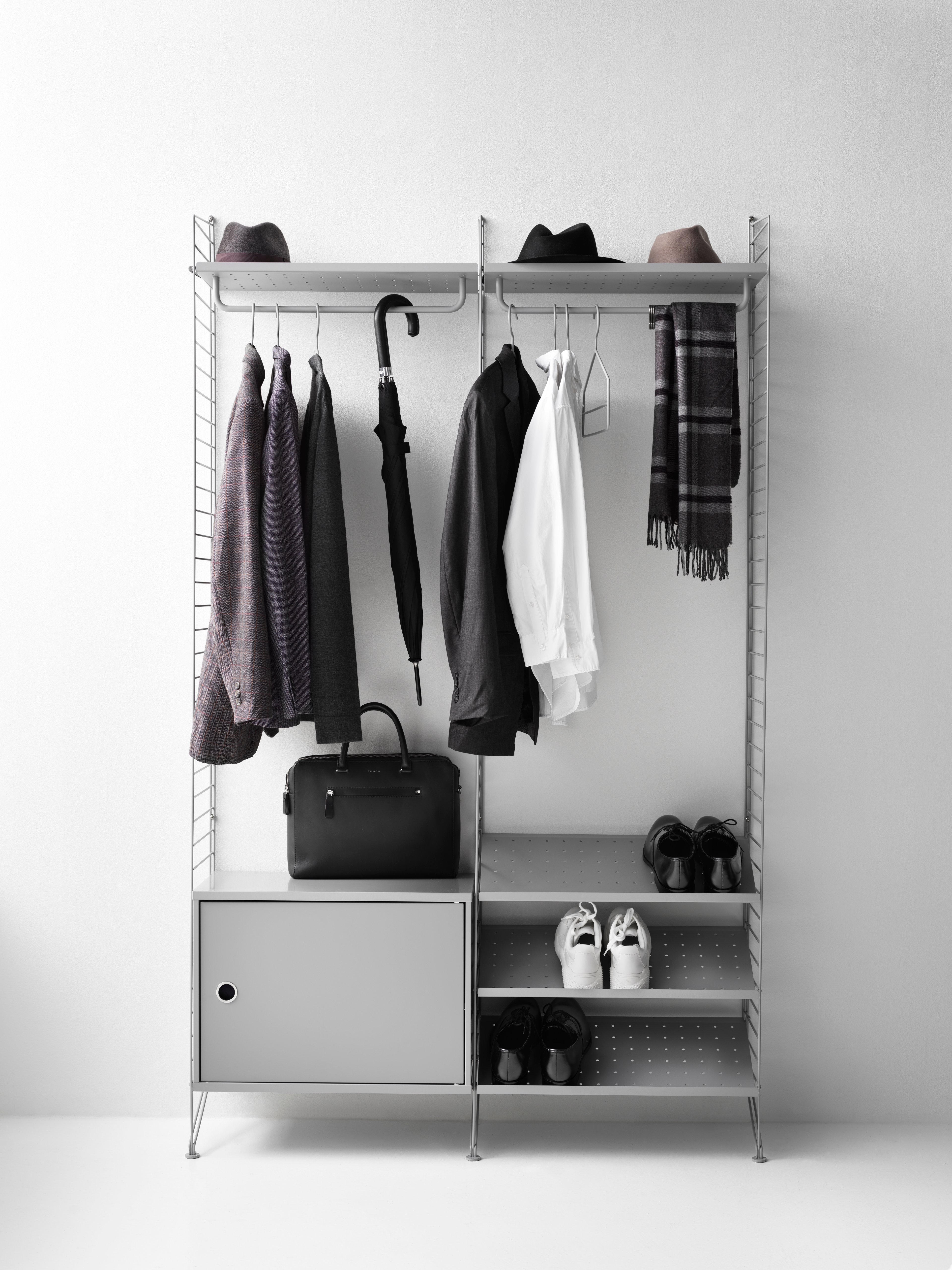 String shelf optimal for your hallway. Floor panels, metal shelves, shoe shelves and cabinet with swing door, rods and hooks in grey.