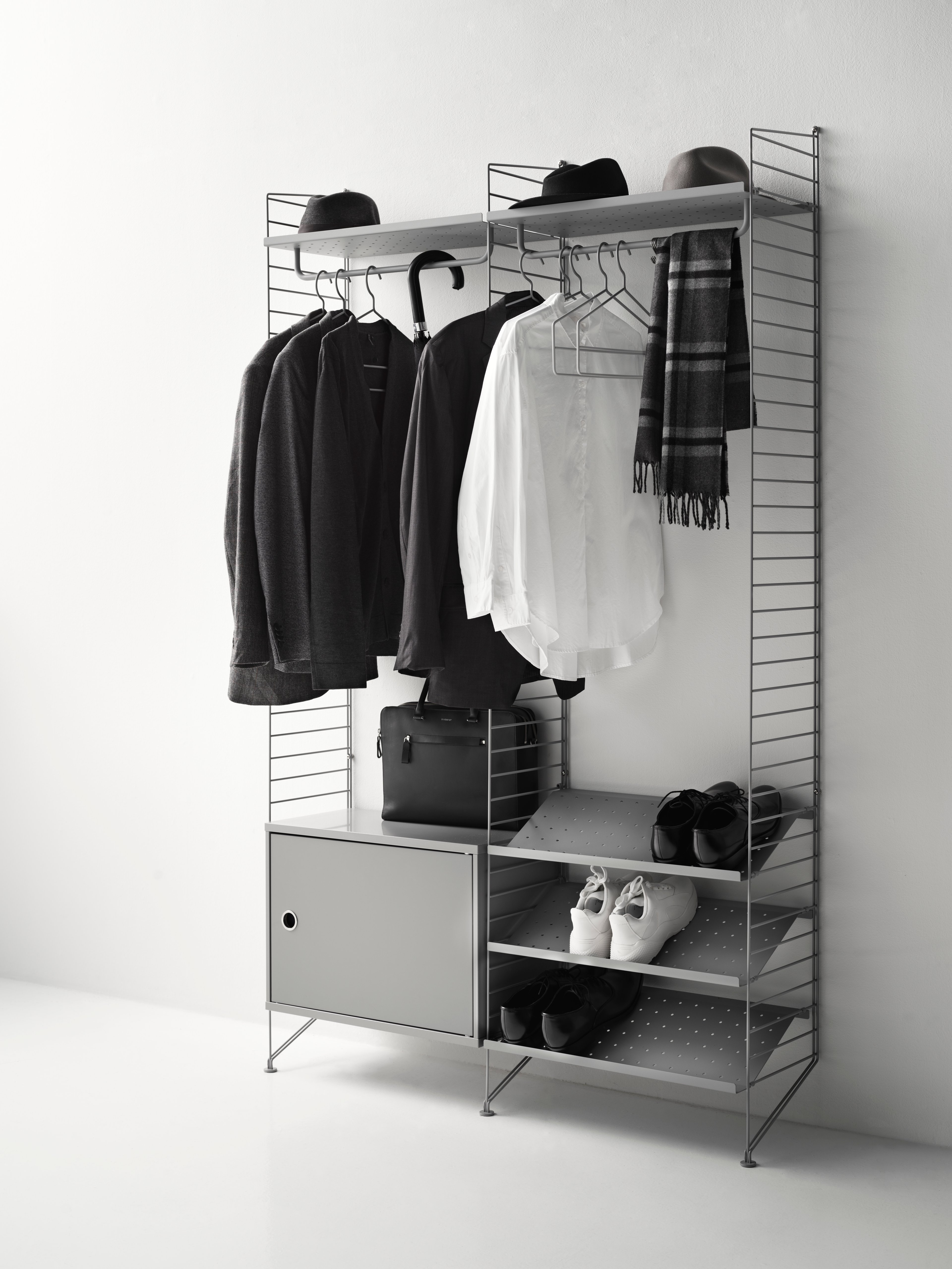 String shelf optimal for your hallway. Floor panels, metal shelves, shoe shelves and cabinet with swing door, rods and hooks in grey.