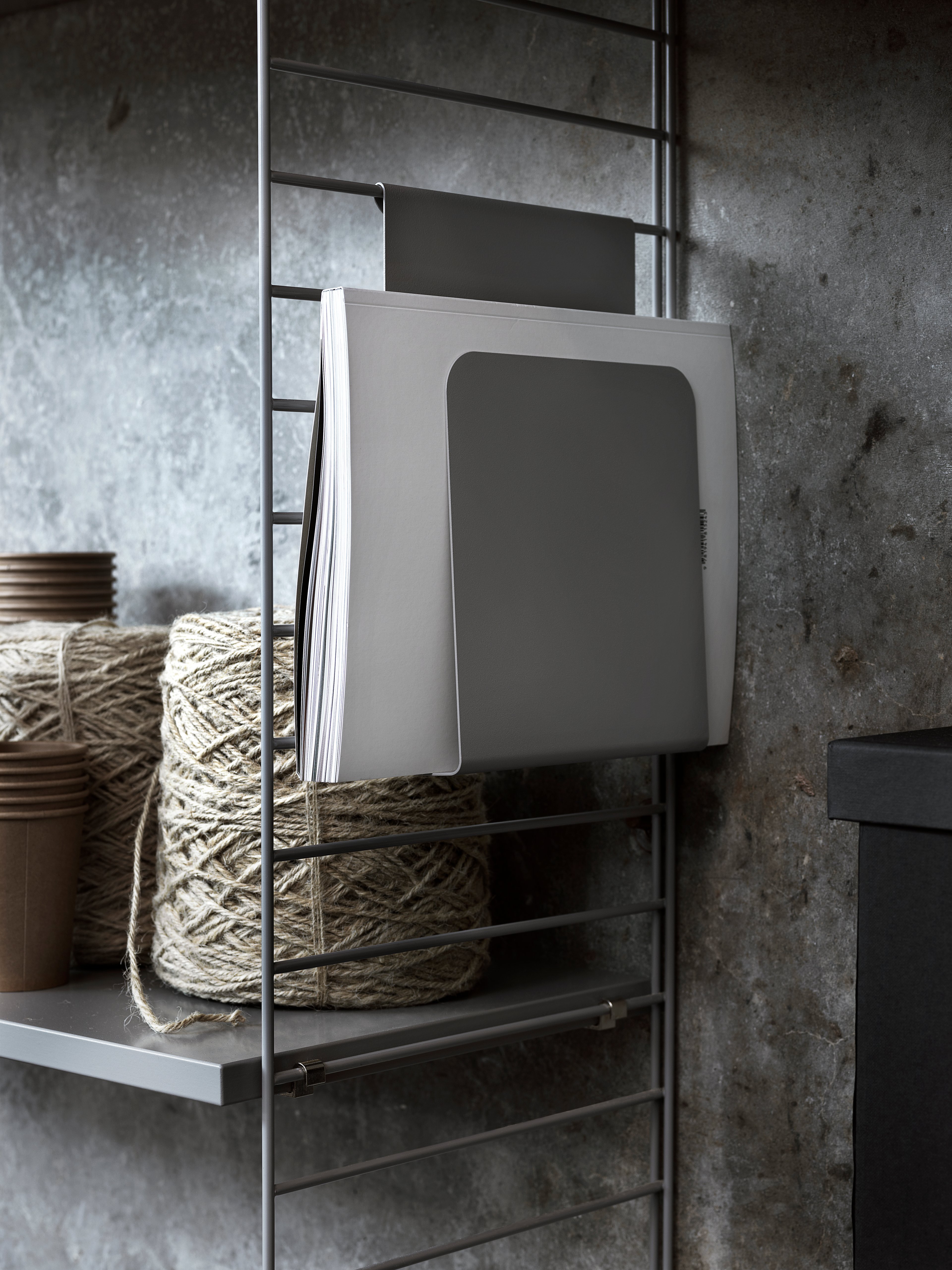 wall panels in grey. magazine holder in grey.